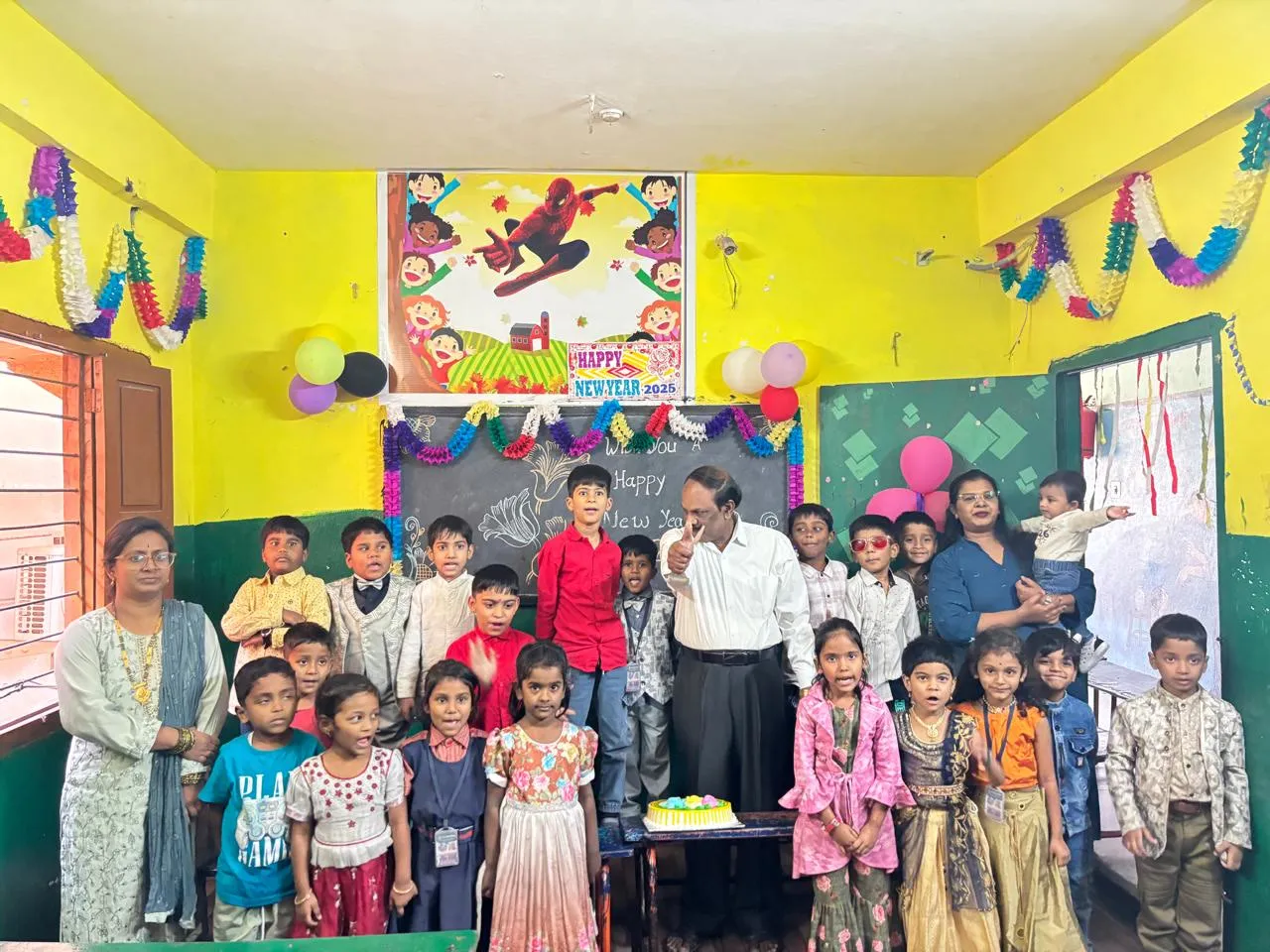 Pre-primary children celebrating New Year in their decorated classroom